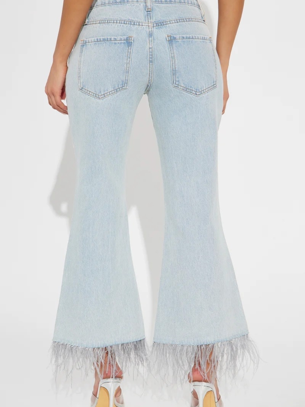 Fashion Nova Light Blue Feather-Hem High-Rise Flare Jeans